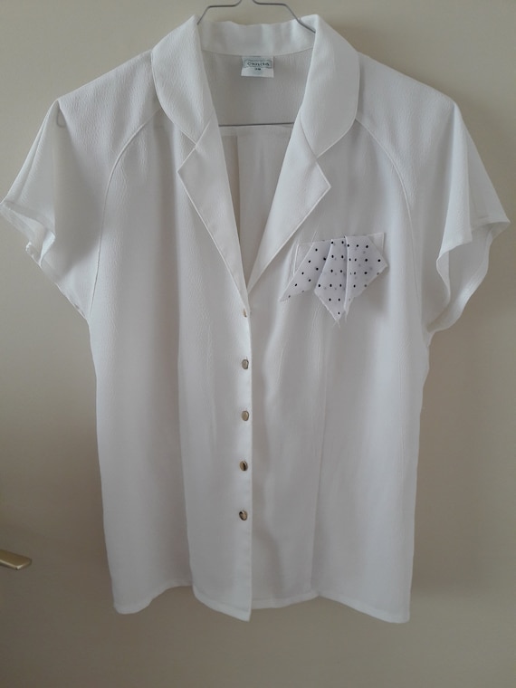 Blusa bianca manica corta sale