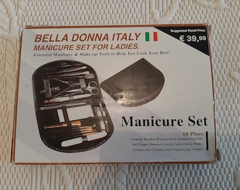 18-piece manicure kit in a leather zipped case, vintage travel manicure set.