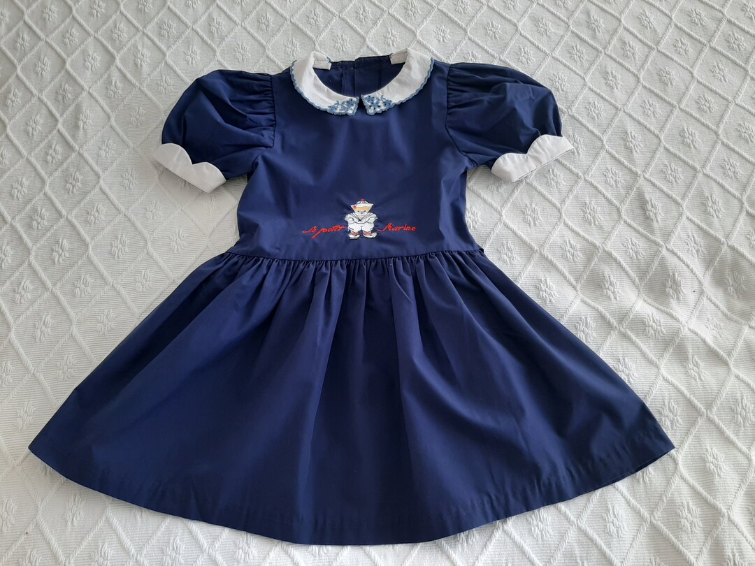 navy blue peter pan collar dress Navy blue short dress with white peter pan collar + cream/tan/beige polka dots