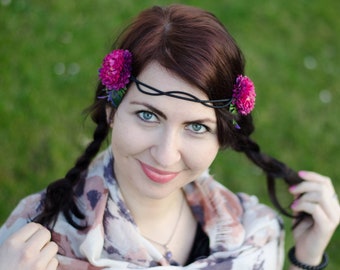 Two pink flowers on an elastic hairband