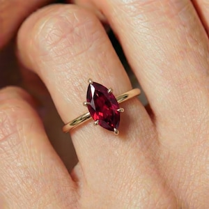 May include: A set of three ceramic nesting bowls in shades of blue, green, and white. The bowls feature a speckled glaze and a simple, modern design. The largest bowl measures approximately 6 inches in diameter.