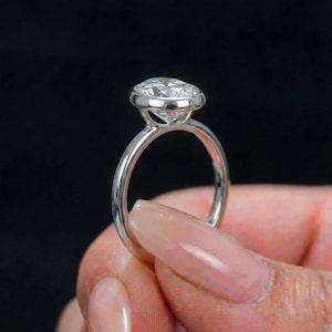 Elegant Oval Moissanite Bezel Set Engagement Ring | 14K Gold Solitaire ...