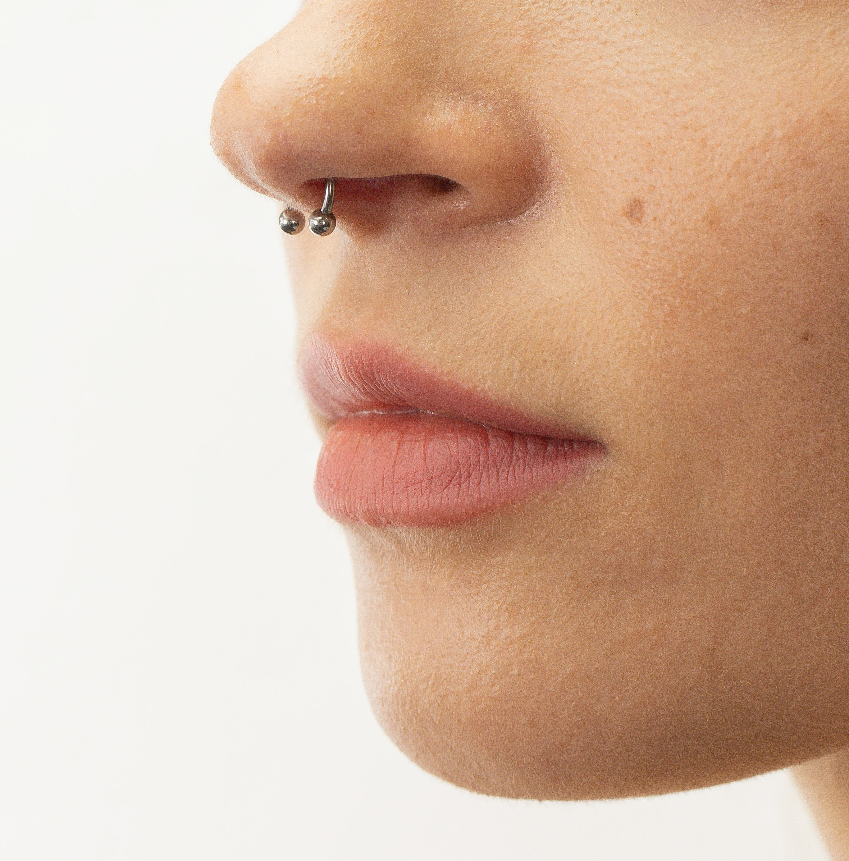 Minimalist septum hotsell piercing