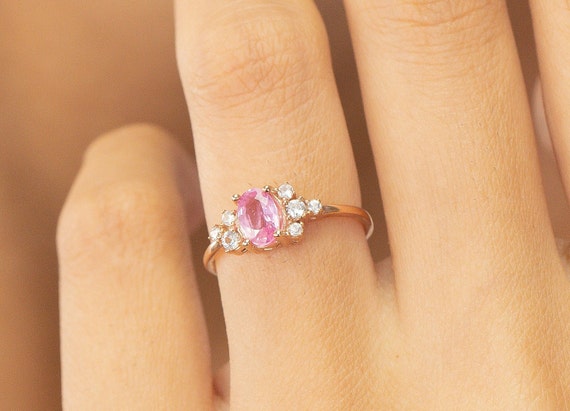 Pink sapphire cluster clearance ring