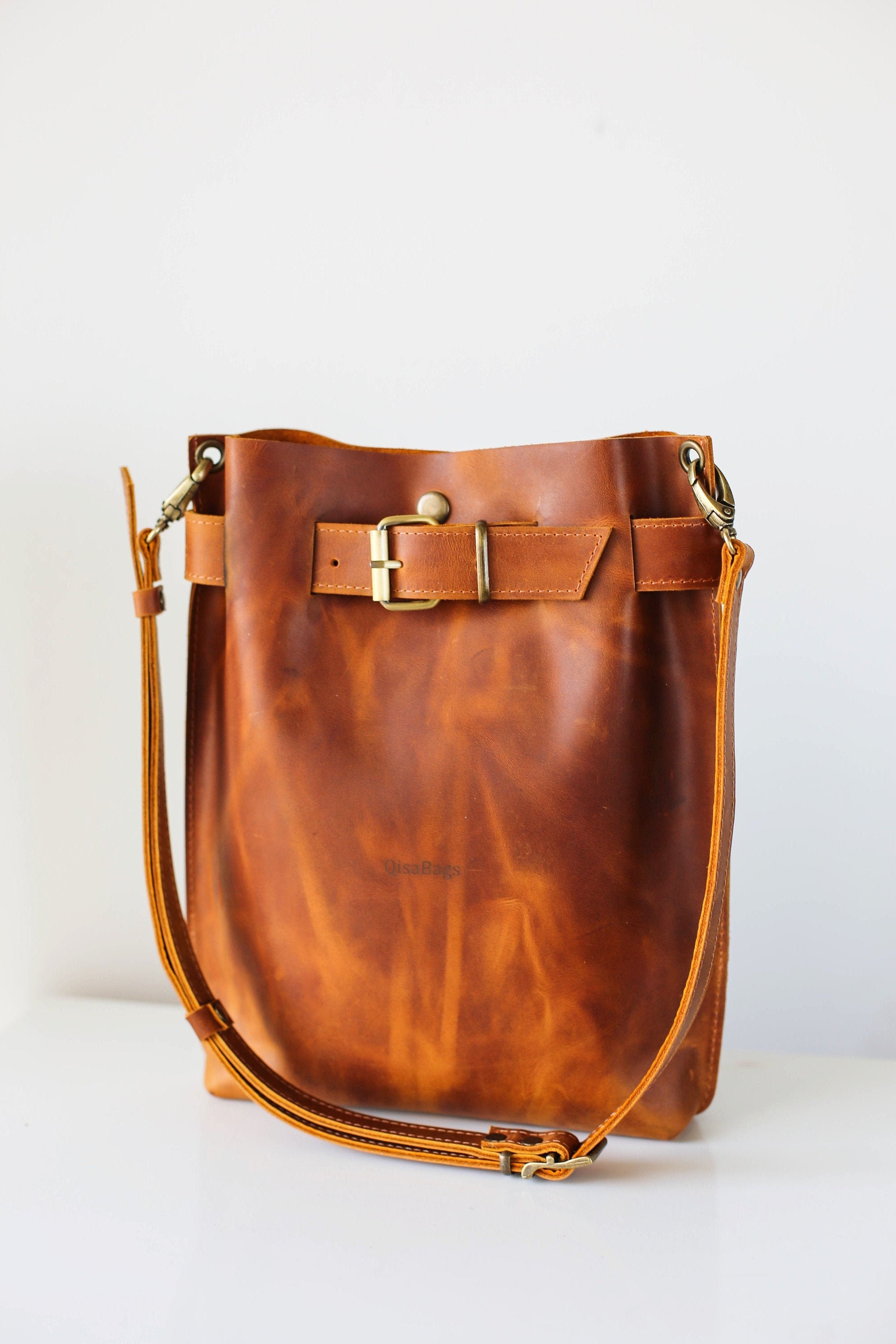 brown leather purse backpack
