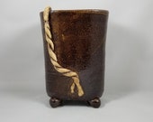 Korean succulent pot. Brown. Oblong. 6.5 quot tall. Top measures 4.5 quot x 3 quot .25 quot