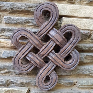 Infinity Knot Wood Carving - Small, rounded, hand carved in Nepal