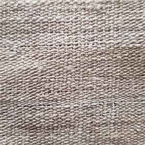 May include: Close-up of a woven fabric with a textured surface. The fabric is a neutral beige color, with a tight weave pattern. The weave creates a grid-like appearance, with visible threads and slight variations in color.