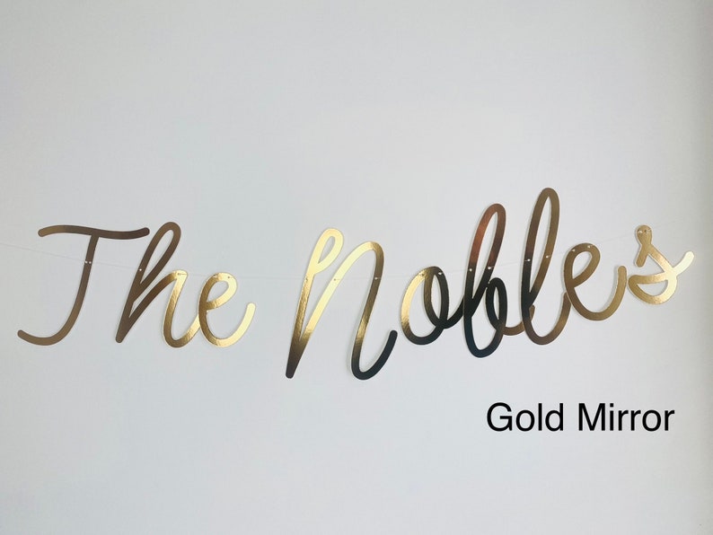 May include: Gold mirror banner with the text "The Nobles" in a cursive font.