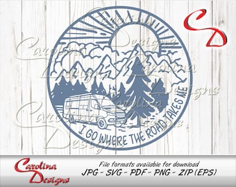 May include: A blue and white circular design with a camper van, mountains, a sun, and clouds. The text "I go where the road takes me" is written around the circle.
