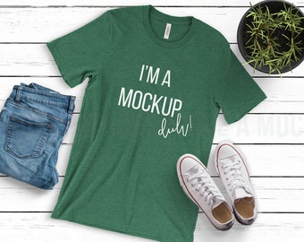 Download Free Bella Canvas 3001 T-Shirt | Heather Grass Green | Unisex Jersey Short Tee | T Shirt Mockup | Feminine FlatLay Mockup | Wooden Clean Mock-Up PSD Template