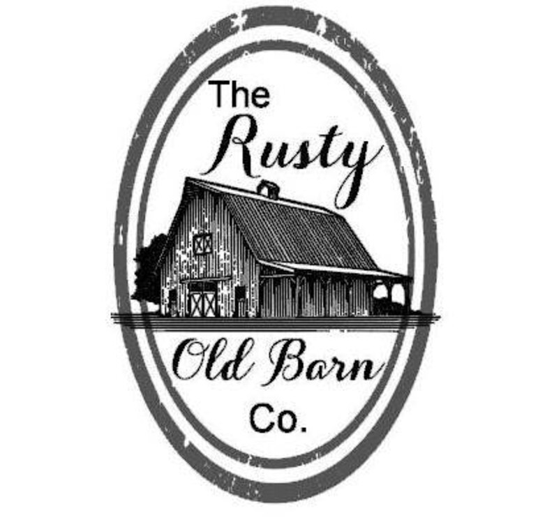 May include: Black and white logo with a distressed oval border. The logo features a drawing of a barn with the text "The Rusty Old Barn Co."