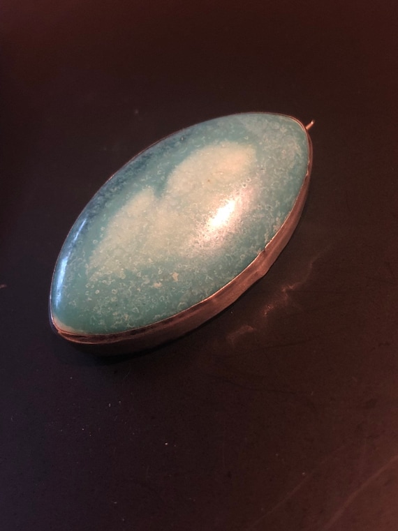 Vintage Ruskin tear shaped brooch