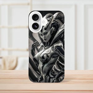 May include: A black and white phone case featuring a detailed illustration of a woman with a futuristic, mechanical design. The woman has long, flowing hair and a sleek, metallic body.
