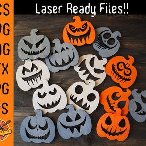 May include: A collection of 12 laser-cut pumpkin designs, featuring various spooky faces. The pumpkins are made of wood and come in three colours: orange, grey, and white. The designs are perfect for Halloween crafts and decorations.