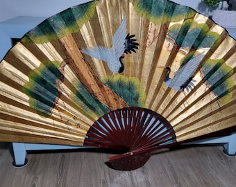 Chinese large fan featuring Painting of Cranes and Lotus Plants with bamboo spokes.