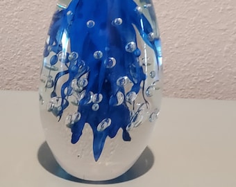 oblong art glass paperweight sculpture, blue and clear glass with suspended bubbles