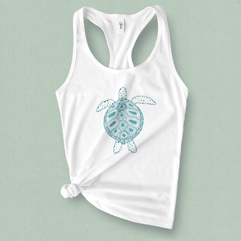 May include: White tank top with a teal blue graphic of a turtle with a detailed shell design.