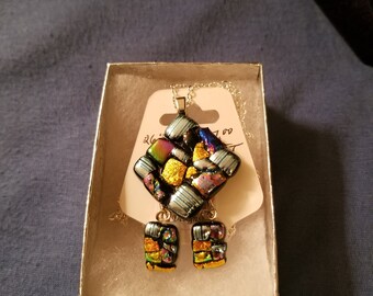 Multi-colored dichroic fused glass pendant necklace/earring set.
