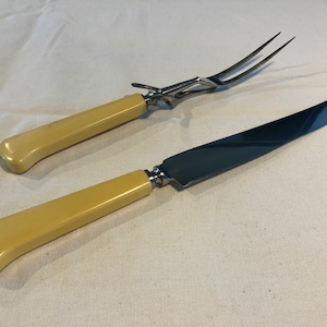 Vintage Winchester Carving Set with Yellow Bakelite Handles.