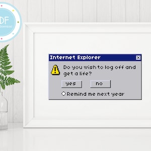 Peut inclure: Une impression encadrée d'un écran d'ordinateur vintage avec un message pop-up qui dit "Internet Explorer Voulez-vous vous déconnecter et avoir une vie ?" avec des boutons qui disent "oui", "non" et "Me le rappeler l'année prochaine".