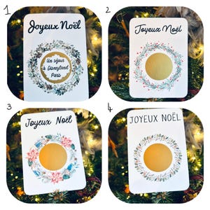 May include: Four white cards with a gold circle in the center and a green wreath around it. The cards have different designs for the wreath and different text at the top. The text on the cards reads: 'Joyeux Noël', 'Joyeux Noël', 'Joyeux Noël', and 'JOYEUX NOËL'. The card in the top left corner also has the text 'Un séjour à Disneyland Paris'.