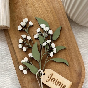 Decorative place cards made of gypsophila branches. Event favors. Weddings, communions, baptisms.