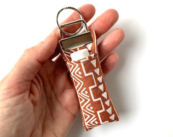 Portachiavi con balsamo per labbra con stampa azteca: tessuto di cotone