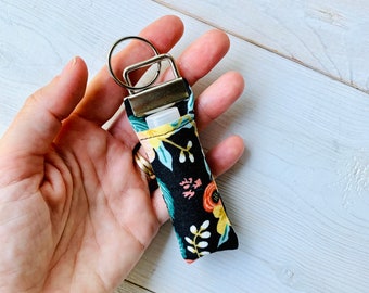 Portachiavi con balsamo per labbra / Rifle Paper Co. Birch Black