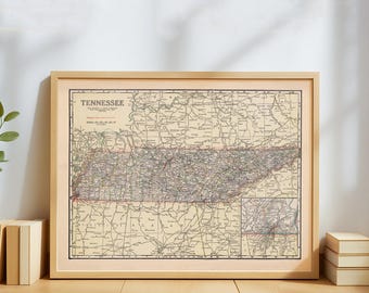 May include: Framed vintage map of Tennessee, featuring detailed road networks and geographical features. The map is printed on aged paper and encased in a light wood frame. The title "Tennessee" is displayed at the top.