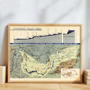 May include: Framed vintage map print of the Tennessee Valley Area, showing the profile of the Tennessee and Clinch Rivers with existing and proposed dams. The map features a detailed illustration with a light brown wooden frame.