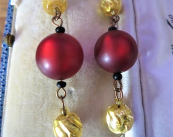 A pair of vintage red venetian glass and gold foil glass dangle earrings