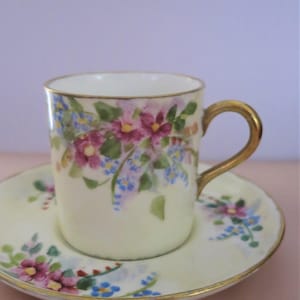 A pretty vintage floral Aynsley English China Coffee Can & Saucer