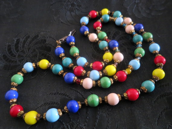 A colourful vintage Art Deco harlequin glass bead… - image 1