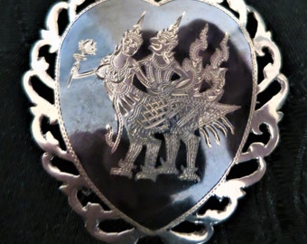 A vintage Sterling silver Niello work brooch from Siam