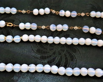 A pair of vintage opaline glass bead necklaces