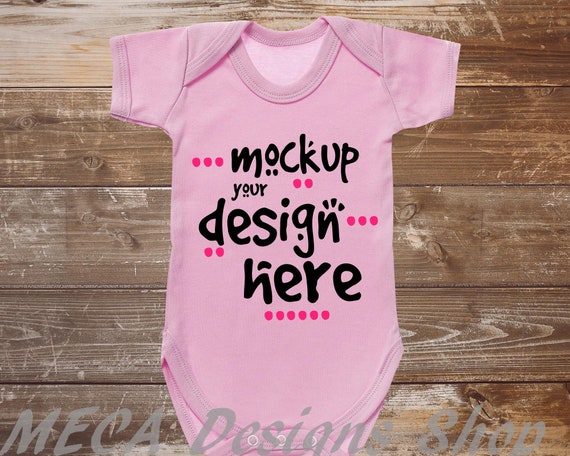 Bodysuit Mockup Light Pink Bodysuit On Weathered Wood Baby