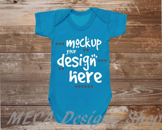 Bodysuit Mockup Sapphire Blue Bodysuit On Weathered Wood Baby