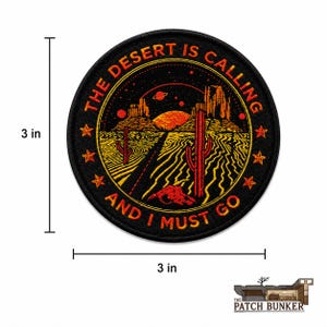 Round black embroidered “The Desert Is Calling And I Must Go” patch with orange, red, and yellow desert landscape artwork, shown on a white background with 3 in width and 3 in height measurement lines and The Patch Bunker logo in the lower-right corner.