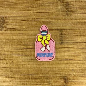 Parche de perfume rosa con lazo, lindo mini neceser termoadhesivo, aplique de 2 x 1 pulgada