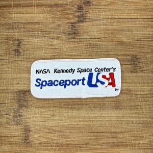 Vintage NASA Spaceport USA Patch Kennedy Space Center Worm Logo 4.25x1.75in  Souvenir