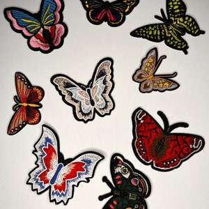 Set of 9 Embroidered Butterfly Iron-On Patches 2 to 3 Inches Red Blue, Silver Campaign, Green Blue, Pink Silver, Yellow Blue, Gray Red