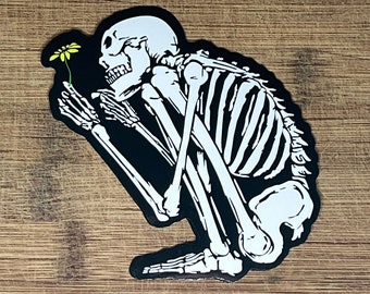 Crouching Skeleton Holding Flower Vinyl Sticker Gothic Art Decal for Laptops 4 Inches