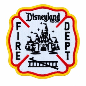 May include: A white embroidered patch with a scalloped edge outlined in red and yellow. It features the black text Disneyland Resort above a black castle silhouette, with the words FIRE and DEPT on the sides and a ladder graphic at the bottom.