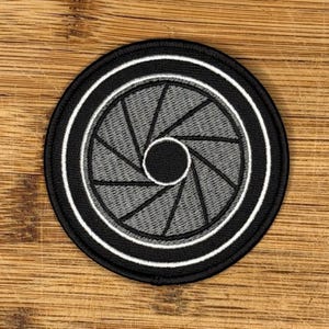 Shutter Speed Camera Lens Patch – 3&quot; Embroidered Iron-On Photography Patch – Photo Gear Accessory for Jackets & Bags