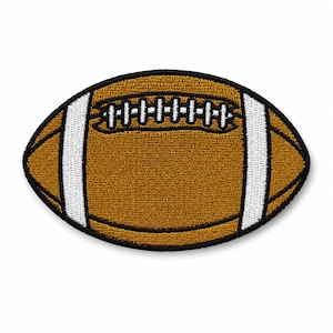 May include: An oval-shaped embroidered patch depicting an American football. The patch features a textured brown surface with white vertical stripes on each side and a central white stitched lace detail, all outlined with a thick black border.