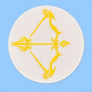 May include: A circular embroidered patch featuring a white fabric background with a bright yellow stitched design of a bow and arrow. The bow is curved with decorative flourishes at the ends, and the arrow is positioned horizontally across the center.