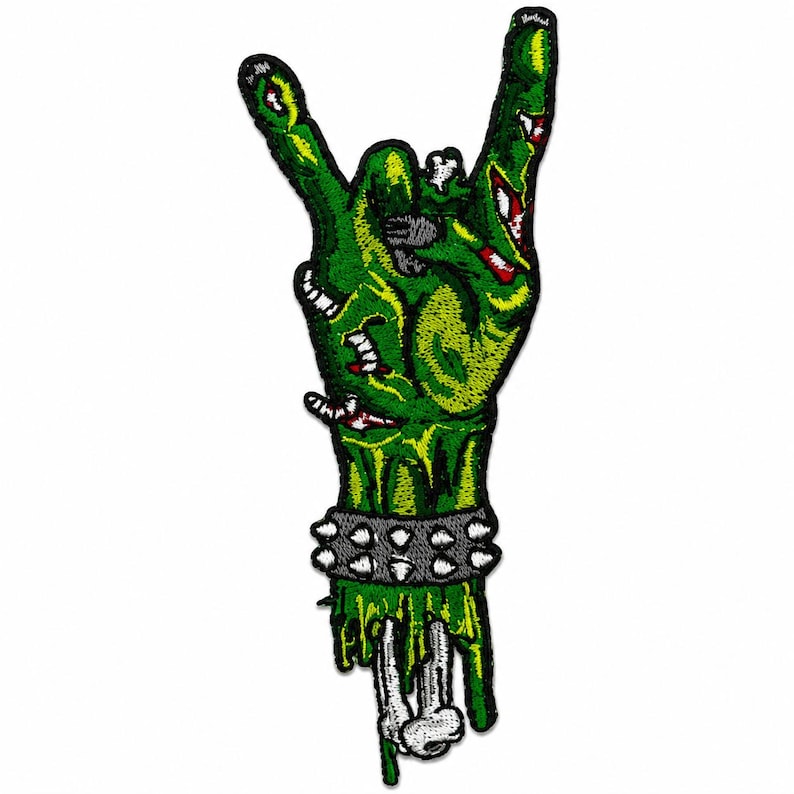 Zombie hand embroidered patch size reference graphic showing a green monster hand making a rock gesture, with exposed bone, torn details, studded bracelet, and a 4x1 inch measurement on a clean white background.