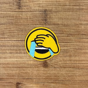 Laughing Facepalm Emoji Iron-On Patch – 1.75&quot; Round Funny Meme Embroidered Patch – Crying Smiley Applique for Jackets, Hats & Backpacks