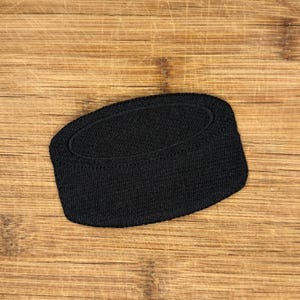 4-Inch Durable Hockey Puck Iron-On Patch – Easy Application for Sports Apparel & Accessories